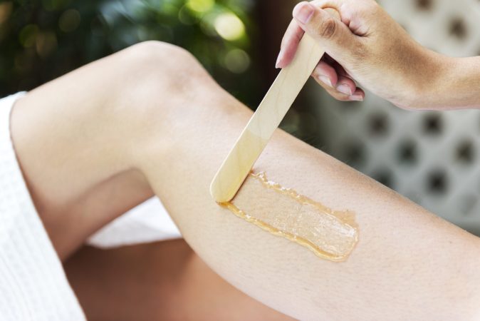 woman-getting-legs-waxed-spa woman-getting-legs-waxed-spa